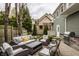 Outdoor patio features a cozy seating area with comfortable furniture, perfect for relaxing and entertaining at 7613 W Stonegate Dr, Zionsville, IN 46077