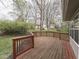 The sprawling back deck features a curved railing and ample space for outdoor furniture at 8160 Bold Forbes Ct, Indianapolis, IN 46217