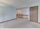 Upstairs landing area with carpeted floors, access to the staircase, and a convenient closet at 8160 Bold Forbes Ct, Indianapolis, IN 46217