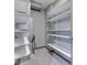 Storage room with carpeted floor and ample white shelving for optimal organization at 8160 Bold Forbes Ct, Indianapolis, IN 46217