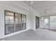 Spacious sunroom with windows and a sliding door for indoor-outdoor flow and natural light at 8160 Bold Forbes Ct, Indianapolis, IN 46217