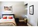 Cozy bedroom with hardwood floors, modern artwork, and comfortable furnishings at 827 Dawson St, Indianapolis, IN 46203