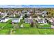 Aerial view of a residential neighborhood featuring lush green lawns, fenced yards, and diverse home styles at 8312 Eagles Nest Dr, Avon, IN 46123