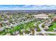 Scenic aerial view of a residential neighborhood with lush green spaces at 8312 Eagles Nest Dr, Avon, IN 46123