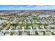 Expansive aerial view showcasing a peaceful neighborhood with a nearby lake at 8312 Eagles Nest Dr, Avon, IN 46123