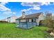 Relaxing backyard view featuring a blue wooden deck on a sunny day at 8312 Eagles Nest Dr, Avon, IN 46123