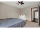 Bedroom with neutral walls, carpet flooring, and a white dresser at 8312 Eagles Nest Dr, Avon, IN 46123
