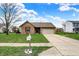 A single-story home with a well-maintained lawn and a mailbox at the front of the property at 8312 Eagles Nest Dr, Avon, IN 46123