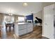 Open floorplan of living and dining area featuring kitchen island and a piano at 8312 Eagles Nest Dr, Avon, IN 46123