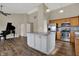 Bright kitchen with stainless steel appliances and an island with granite countertops at 8312 Eagles Nest Dr, Avon, IN 46123