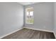 Cozy bedroom with neutral carpet and a window, offering a peaceful retreat at 8570 Hudson Way, Brownsburg, IN 46112