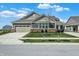 Charming single-Gathering home with a well-manicured lawn, two-car garage, and inviting curb appeal at 8570 Hudson Way, Brownsburg, IN 46112