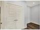 Hallway closet features double doors and modern flooring, providing ample storage at 8570 Hudson Way, Brownsburg, IN 46112