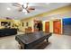 Basement area featuring a billiards table, kitchenette, and a spacious entertainment area at 8890 N Pennington Rd, Mooresville, IN 46158