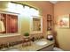 Well-lit bathroom features double vanity with granite countertops at 8890 N Pennington Rd, Mooresville, IN 46158
