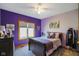 Charming bedroom with bright wall colors, a window view and a comfortable-looking queen-sized bed at 8890 N Pennington Rd, Mooresville, IN 46158