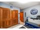 Bonus room with custom Ford-themed decor, a large closet, and ample storage space at 8890 N Pennington Rd, Mooresville, IN 46158