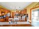 Well-equipped kitchen with wooden cabinetry, stainless steel appliances, and a breakfast bar at 8890 N Pennington Rd, Mooresville, IN 46158