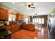 Warm and inviting kitchen with custom wood cabinets, granite countertops, and hardwood flooring at 8890 N Pennington Rd, Mooresville, IN 46158
