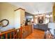 Inviting living room with a cozy fireplace, hardwood floors, and a comfortable gray sofa at 8890 N Pennington Rd, Mooresville, IN 46158