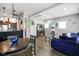 Open living space with modern decor featuring a cozy seating area with a modern electric fireplace at 8890 N Pennington Rd, Mooresville, IN 46158