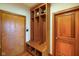 Mud room featuring wooden lockers and doors at 8890 N Pennington Rd, Mooresville, IN 46158