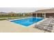 Bright community pool with lounge chairs and adjacent shelter for relaxing on hot summer days at 9763 Rolling Plain Dr, Noblesville, IN 46060