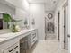 Bright bathroom with modern vanity, granite countertops, and tile floors is perfect for starting your day at 9847 Bryce Blvd, Pendleton, IN 46064
