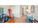 Cozy bedroom with closet, small table and view to hallway and other rooms at 9847 Bryce Blvd, Pendleton, IN 46064
