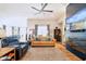 Spacious living room with stylish furniture, hardwood floors, fireplace, and a welcoming atmosphere at 9847 Bryce Blvd, Pendleton, IN 46064