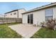 Backyard with a patio and sliding glass doors leading into the home at 10861 Tealpoint Dr, Indianapolis, IN 46229