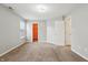 Bright bedroom with plush carpeting, closet, and lots of natural light at 10861 Tealpoint Dr, Indianapolis, IN 46229
