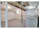 Basement area featuring a washing machine and open layout, perfect for storage or utility purposes at 1125 N Colorado Ave, Indianapolis, IN 46201
