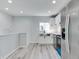 Beautiful, modern kitchen with stainless appliances, farmhouse sink and bright lighting at 1125 N Colorado Ave, Indianapolis, IN 46201