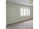 Bright bedroom with a large window, offering a view and natural light at 1131 Canterbury S Sq, Indianapolis, IN 46260