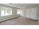 Spacious bedroom with ample closet space and windows, providing storage and natural light at 1131 Canterbury S Sq, Indianapolis, IN 46260