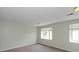 Neutral bedroom offering two windows and plush carpeting for comfort and natural lighting at 1131 Canterbury S Sq, Indianapolis, IN 46260