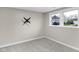 Calm bedroom features a ceiling fan and a window with a view of the backyard at 11423 Mutz Cir, Indianapolis, IN 46229