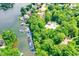 Aerial view of community docks on waterfront surrounded by lush greenery at 11525 Capistrano Cir, Indianapolis, IN 46236