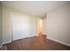 Spacious bedroom with durable flooring, natural light, and convenient access to the closet at 11525 Capistrano Cir, Indianapolis, IN 46236