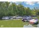 Several boats are docked in their slips on a calm lake at the community docks at 11525 Capistrano Cir, Indianapolis, IN 46236