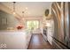 Well-lit kitchen featuring stainless steel appliances, granite countertops and a window bench at 11525 Capistrano Cir, Indianapolis, IN 46236