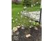 Attractive garden bed with flowering shrubs, enhancing the curb appeal of the property at 11525 Capistrano Cir, Indianapolis, IN 46236