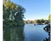 Scenic waterfront view with boat docks and tranquil lake at 11525 Capistrano Cir, Indianapolis, IN 46236