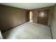 Bedroom with carpet, closet, and doorway at 1235 Cottonwood Ct, Carmel, IN 46033