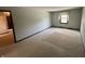 Bright bedroom with a window and neutral carpeting at 1235 Cottonwood Ct, Carmel, IN 46033