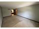 Spacious carpeted main bedroom, with ensuite bathroom entrance, provides a comfortable retreat at 1235 Cottonwood Ct, Carmel, IN 46033