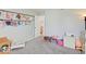bedroom featuring gray carpet, and storage for toys and books at 12723 Pinetop Way, Noblesville, IN 46060