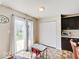 Cozy dining area with dark cabinets and bright natural light, creates a welcoming atmosphere for meals at 12723 Pinetop Way, Noblesville, IN 46060