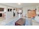 Open living space with modern decor, seamlessly connecting the kitchen, living, and dining areas at 12723 Pinetop Way, Noblesville, IN 46060